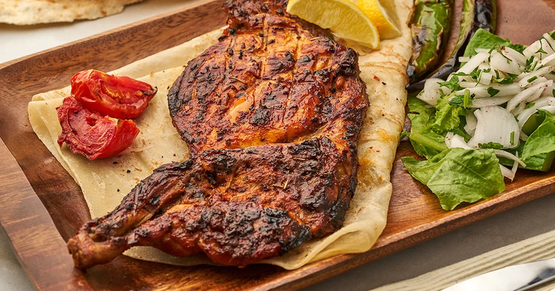 نصف دجاج مشوي فحم