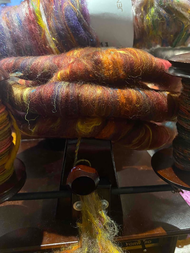 Spinning on a stunning wheel and our Australian Roberta -E spinner.