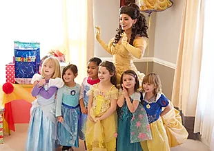 Princess party entertainer leading a group of children in a fun activity at a Toronto birthday celebration.