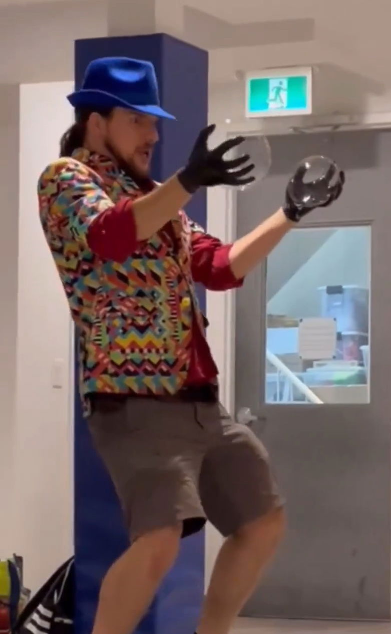 Bubble show entertainer performing an indoor bubble and contact juggling act during a daycare show in Toronto