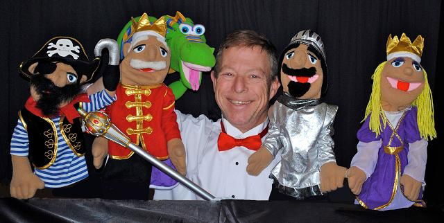 Professional children party entertainers performing a children’s puppet show with colourful puppet characters at a kids party event in Toronto