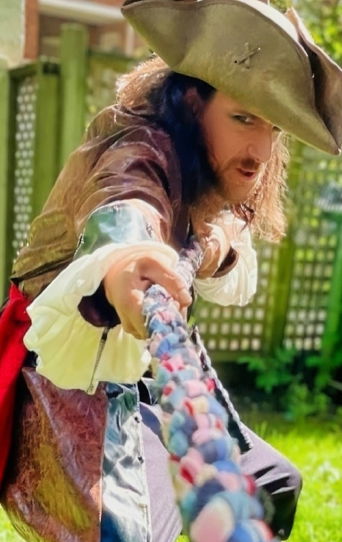 Pirate party entertainer leading an interactive pirate game during a kids birthday party in Toronto