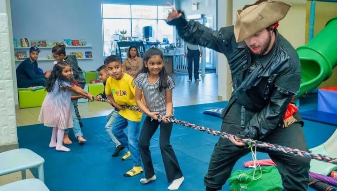 Pirate party entertainer leading interactive kids party entertainment during a birthday party in Toronto