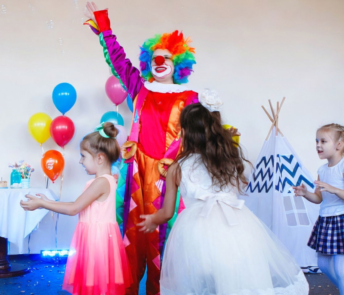 Kids birthday party clowns entertaining children with interactive games at a Toronto birthday party