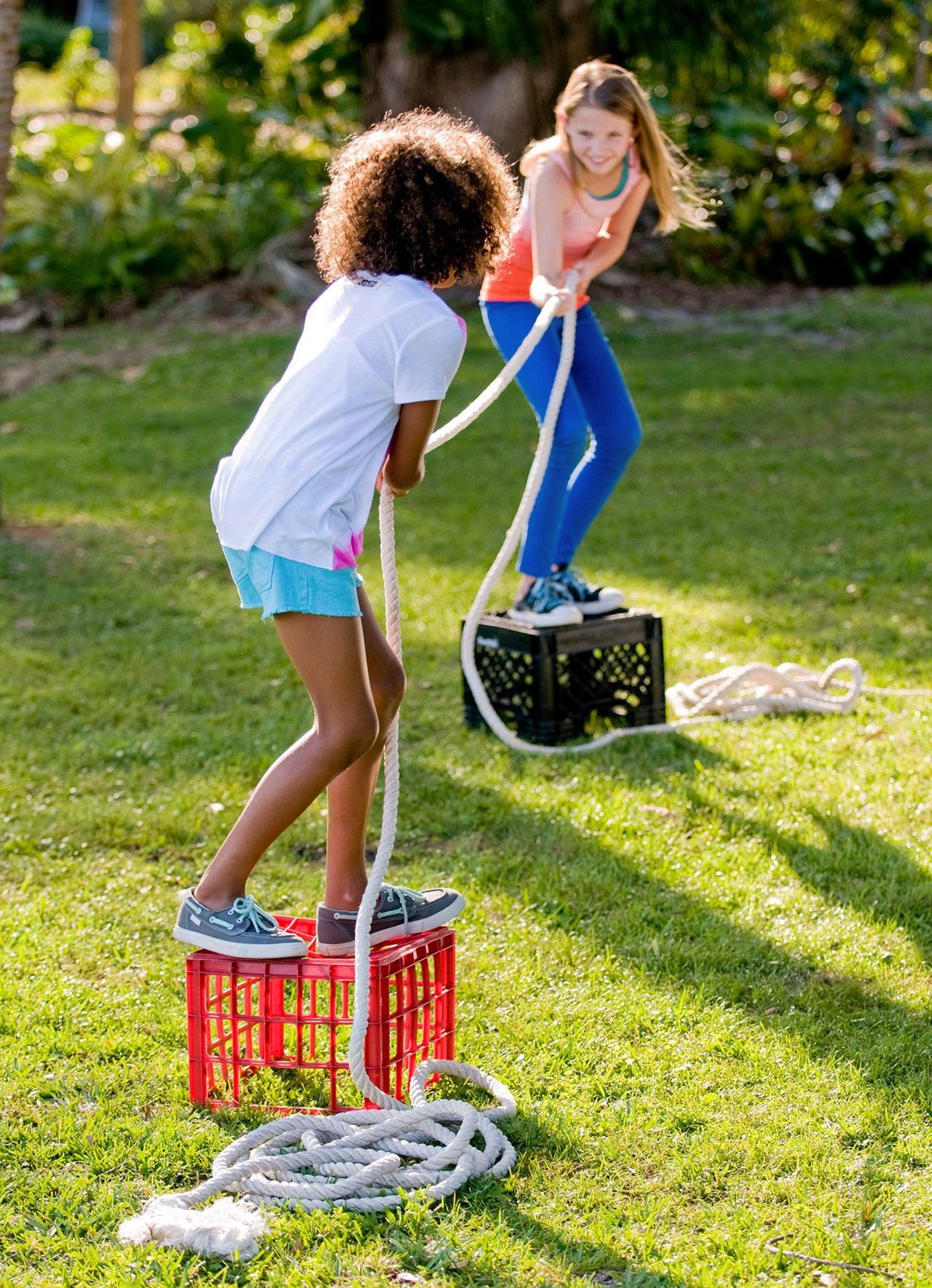Kids playing an outdoor party team challenge game at a children’s party in Toronto