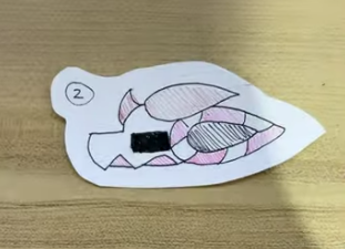 Here are some dragon puppet designs to copy.