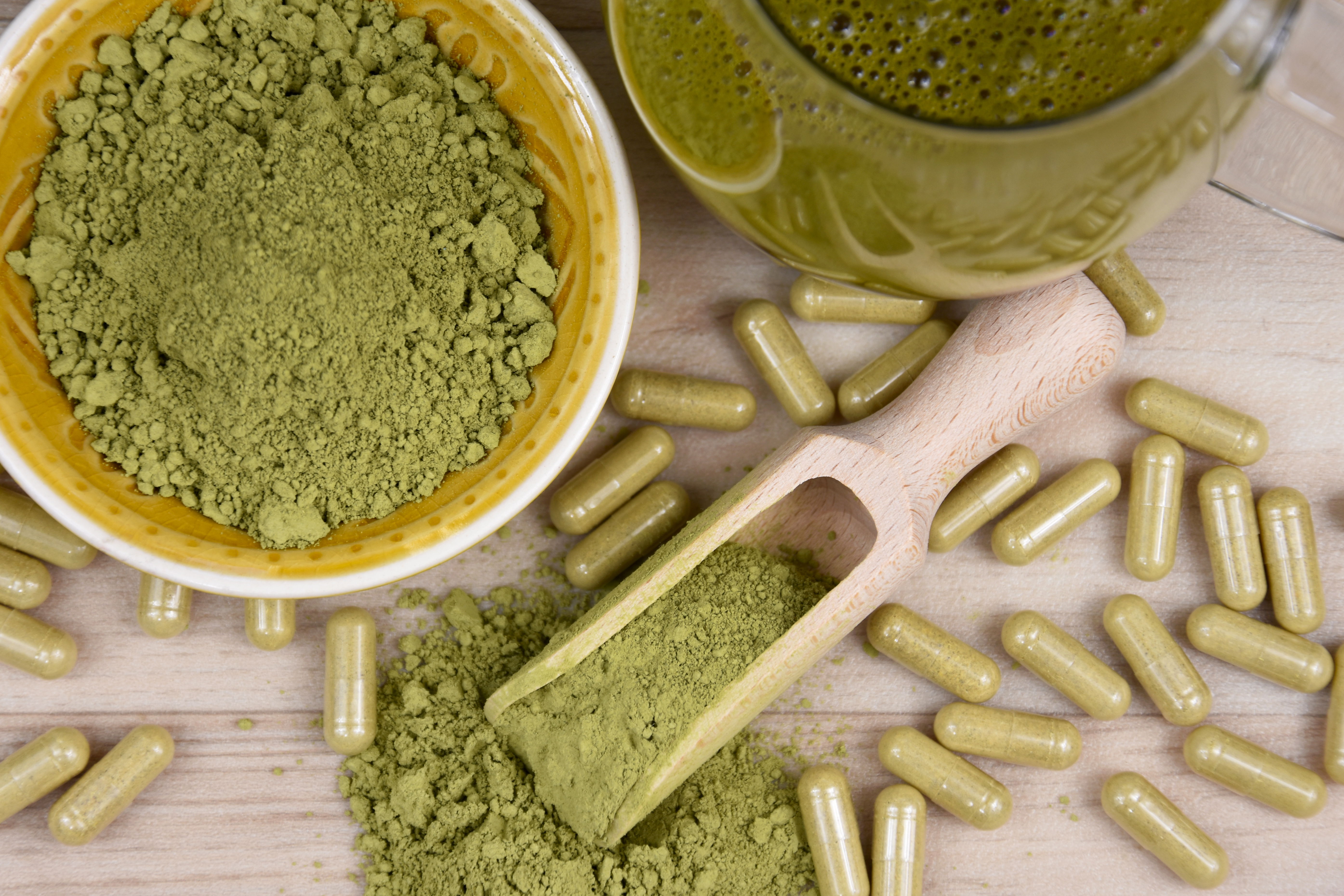 Kratom in capsule form and powder form.