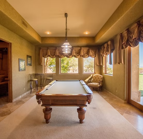 a pool table side lounge area. One of many luxury activity rooms at the Summit Sanctuary in Scottsdale.