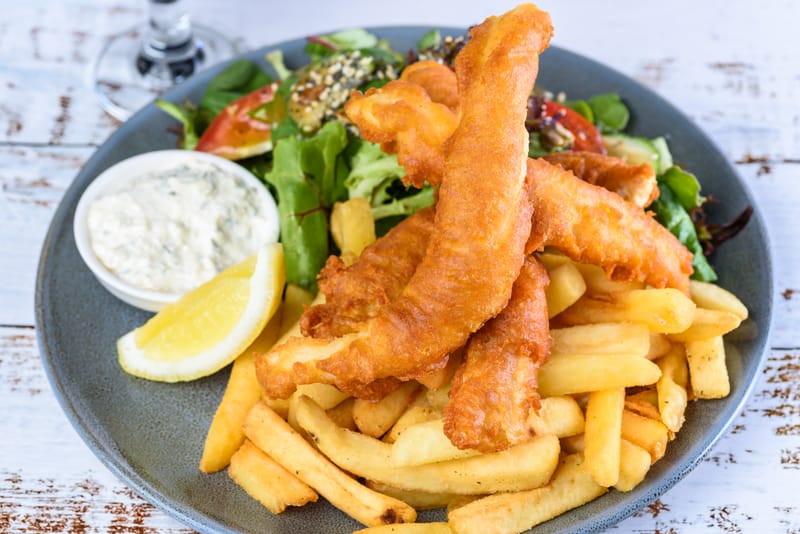 Fresh fish with chips and salad