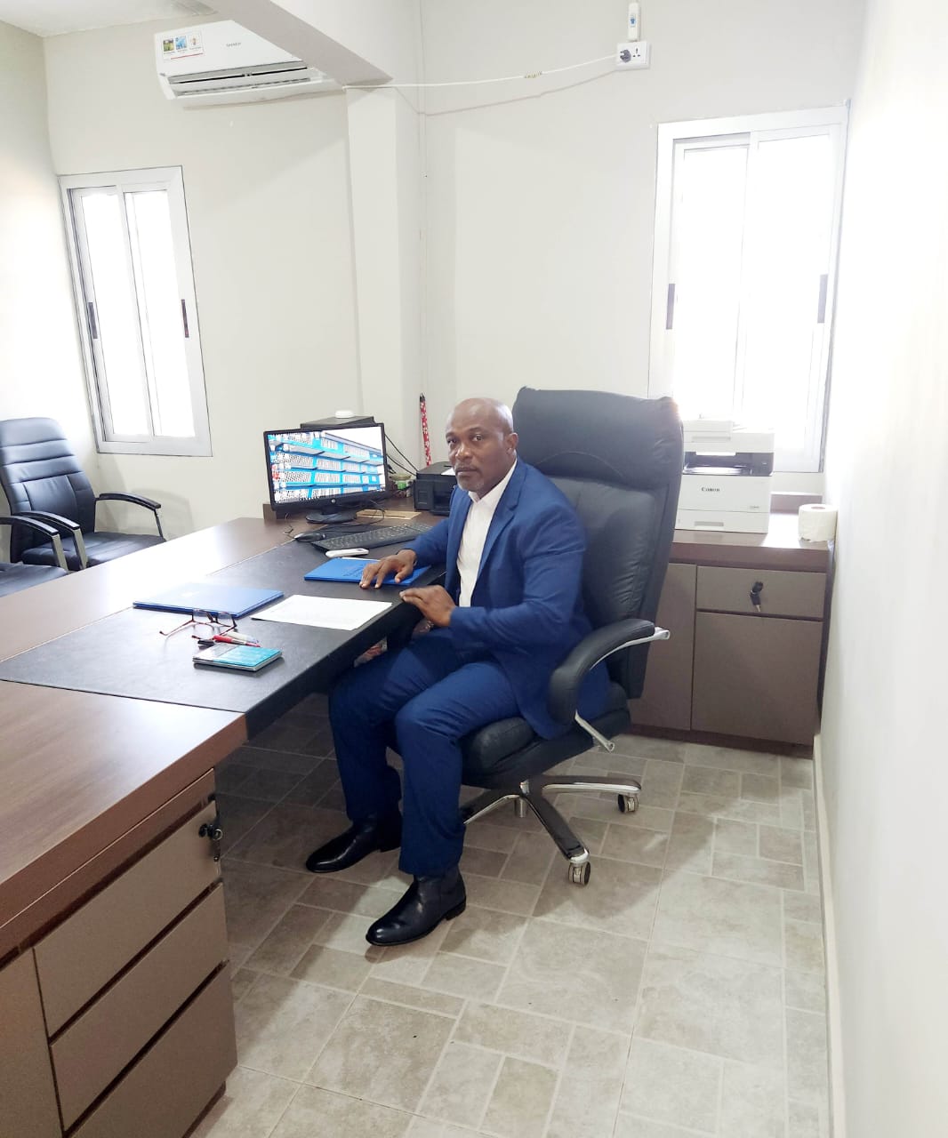The visionary behind this great work Mr. Boye, in office as usual carrying out his daily administrative duties.