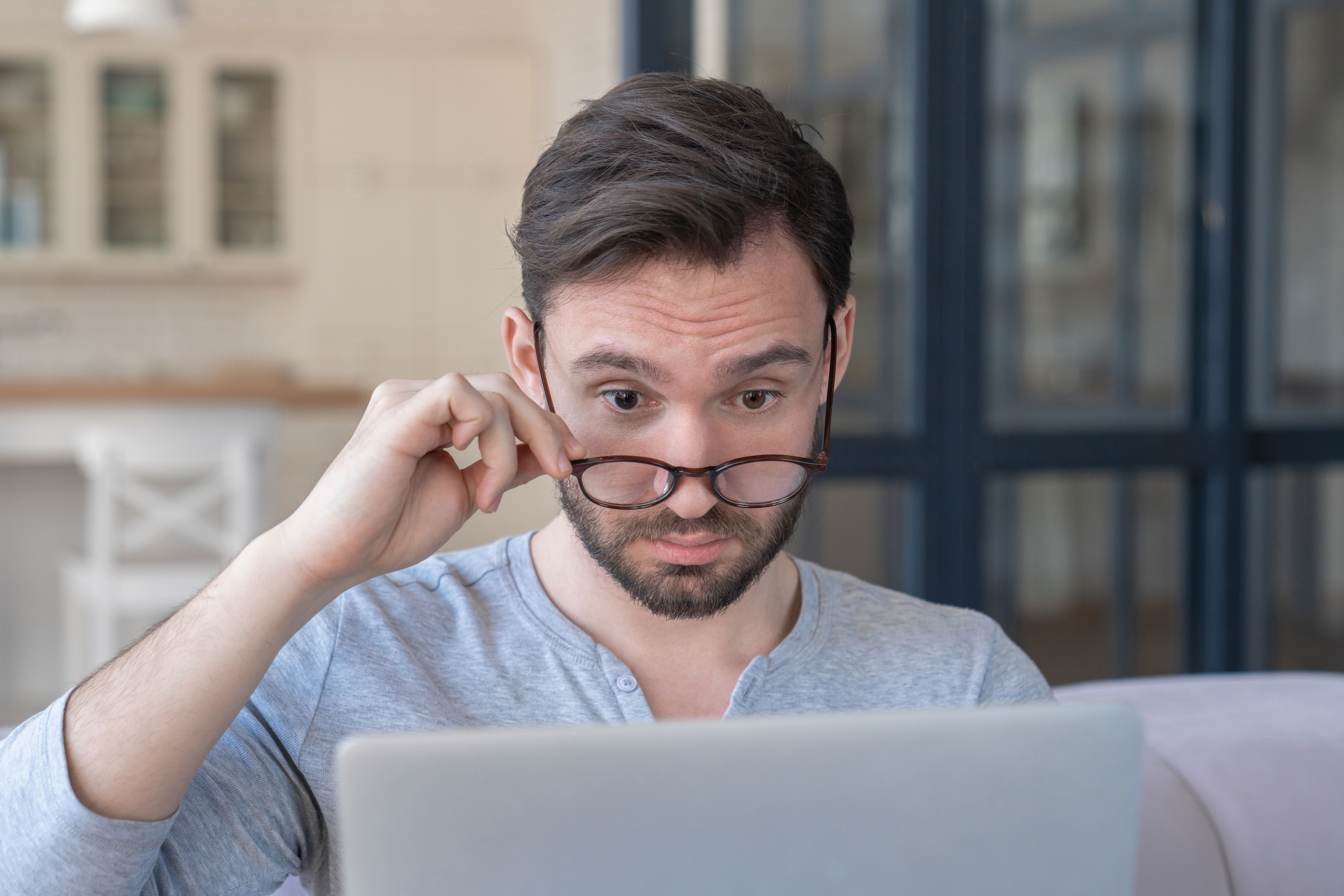 staring at the computer from Astory Media