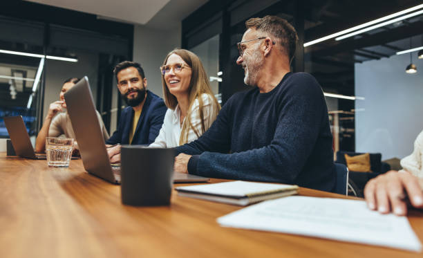 Young professional smiling during a meeting
