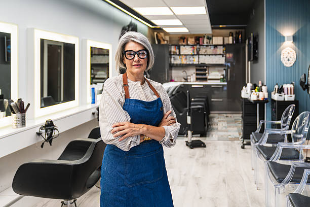 Entrepreneur standing in front of their storefront