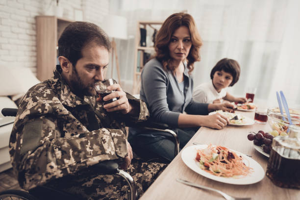 Military family eating dinner together