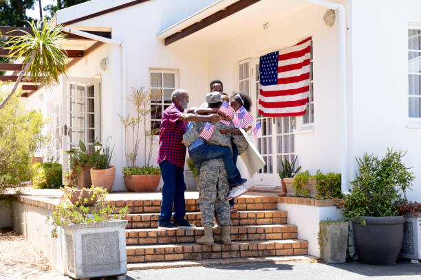 Veteran family standing on their front porch