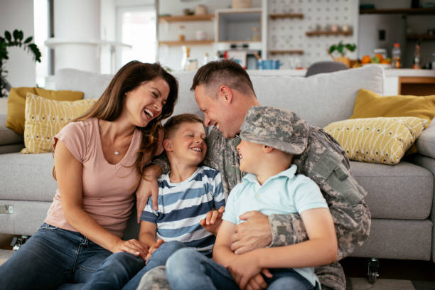 Military spouse and children at home