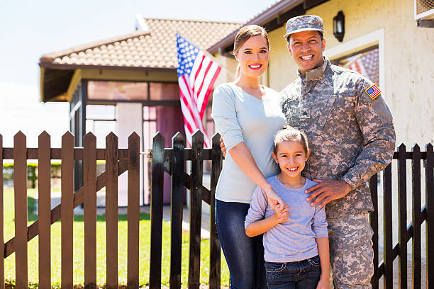Army veteran in uniform standing outdoors
