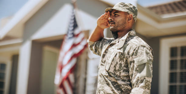 Veteran in uniform saluting
