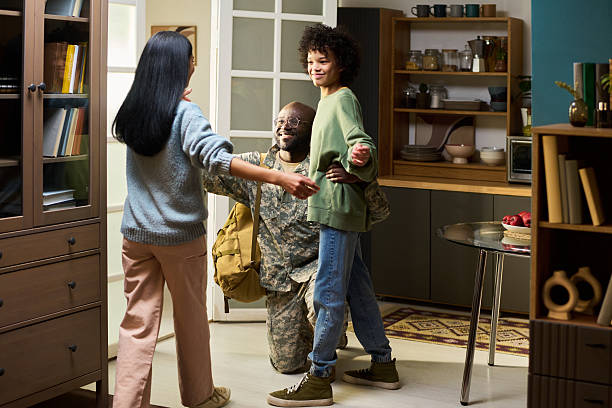 Veteran greeting family
